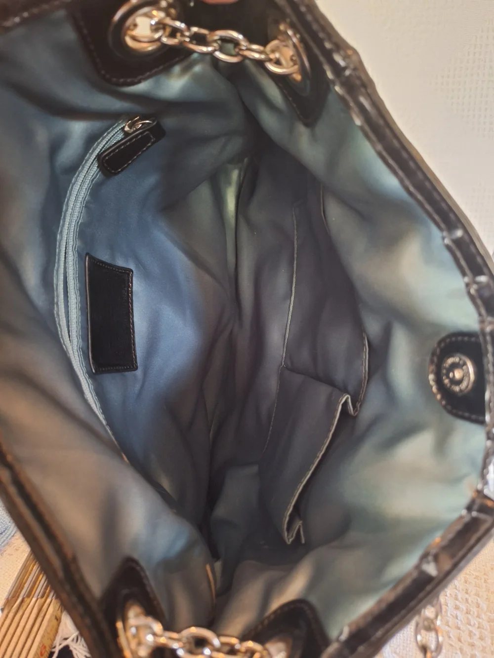Coach sleek black